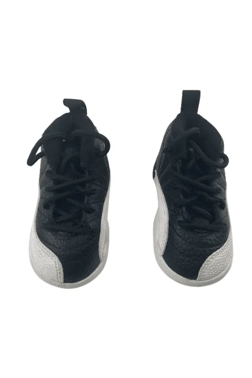 Air Jordan unisex kids black and white high top sneakers size 4C
